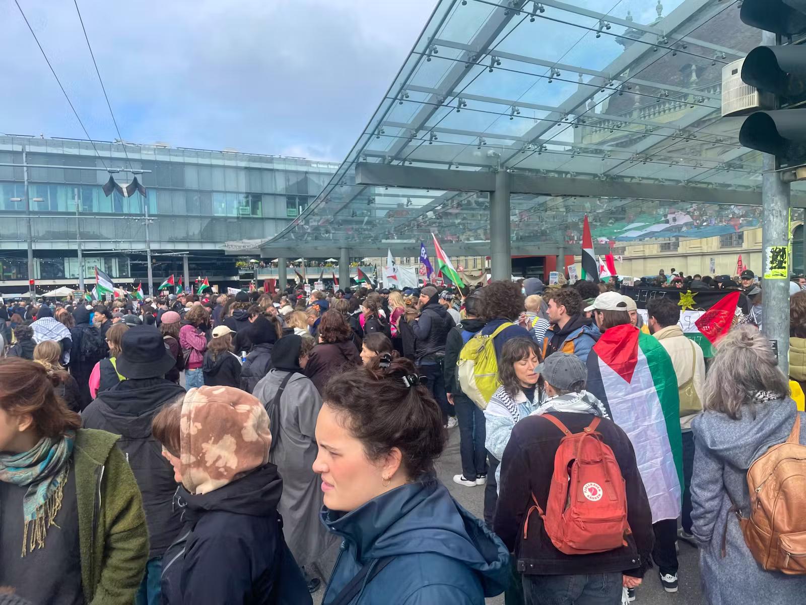 A central square in Bern, filled with protesters