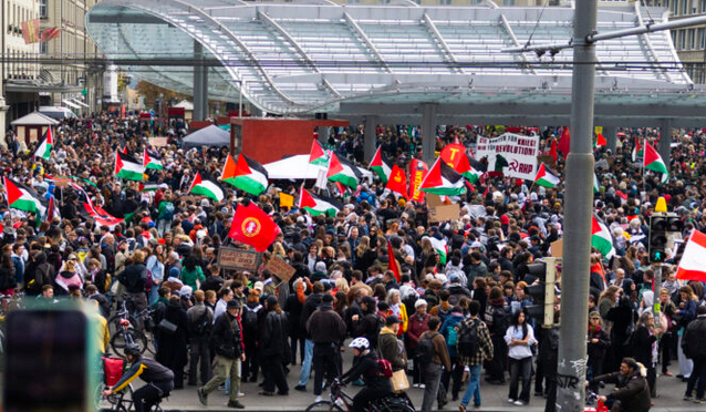 Aerial view of the same square, packed with protesters